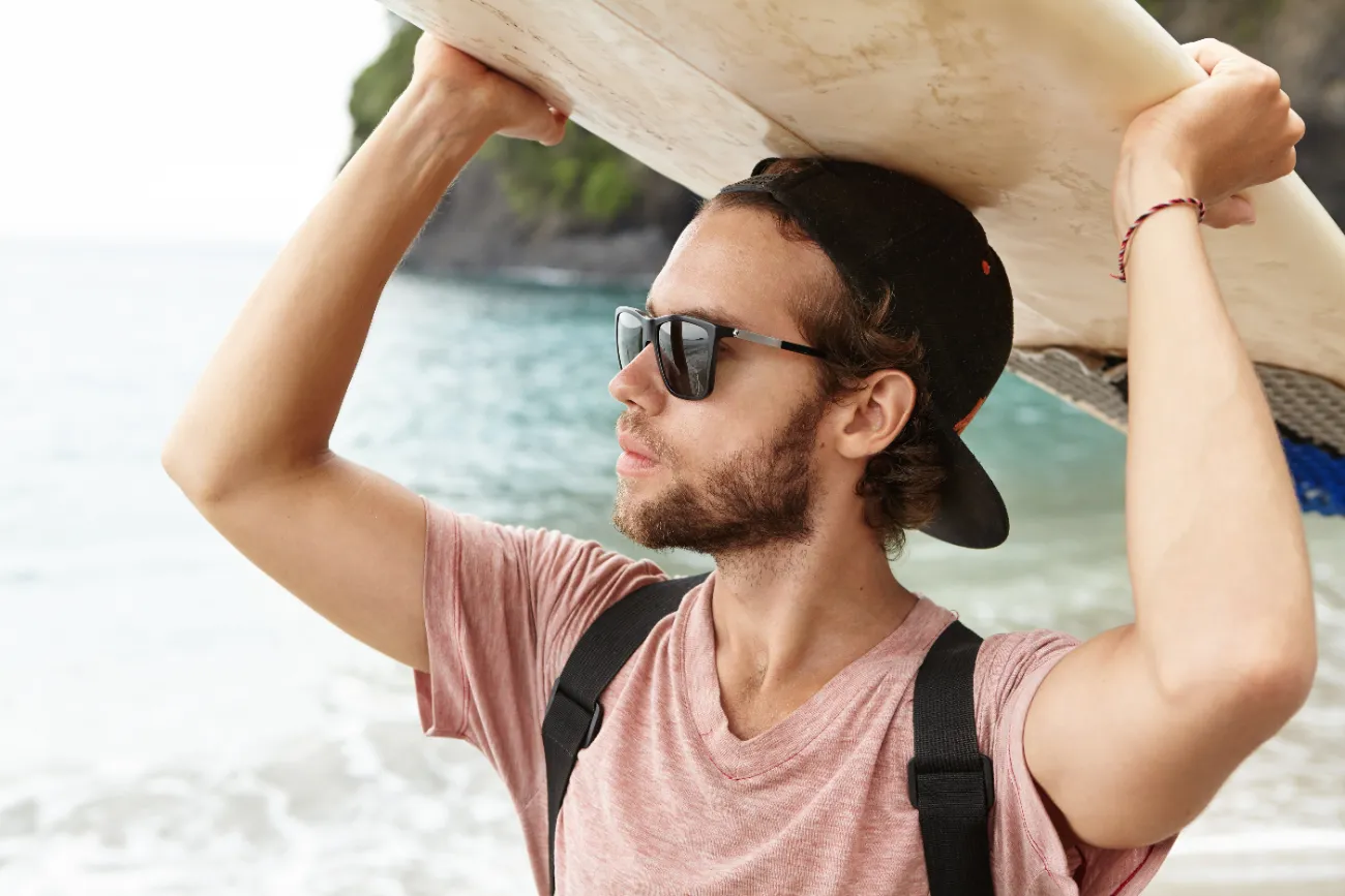Surfer wearing polarised sunglasses