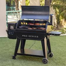 Pit Boss Pro Series competition-grade pellet grill with heavy-gauge steel construction on a backyard lawn